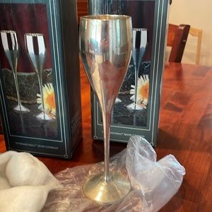 6 boxes, 12 silver champagne flutes. International silver company